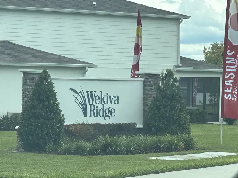 Charming entrance to Seasons at Wekiva Ridge by Richmond American Homes, surrounded by lush greenery in Mount Dora, FL. Charming entrance to Seasons at Wekiva Ridge by Richmond American Homes, surrounded by lush greenery in Mount Dora, FL.