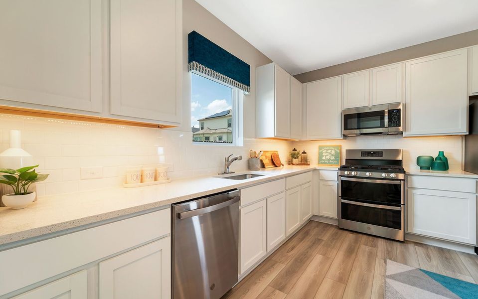 Furnished interior in a model home at Hunter's Ranch in San Antonio (Image 24).