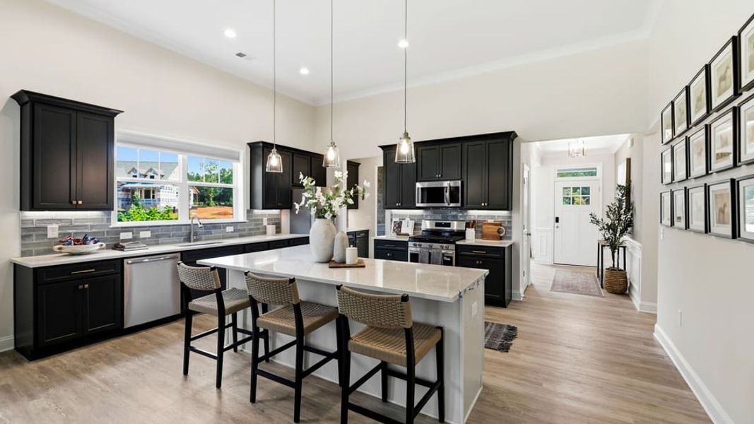 Furnished interior in a model home at Arrowood Acres in Enoree (Image 14).