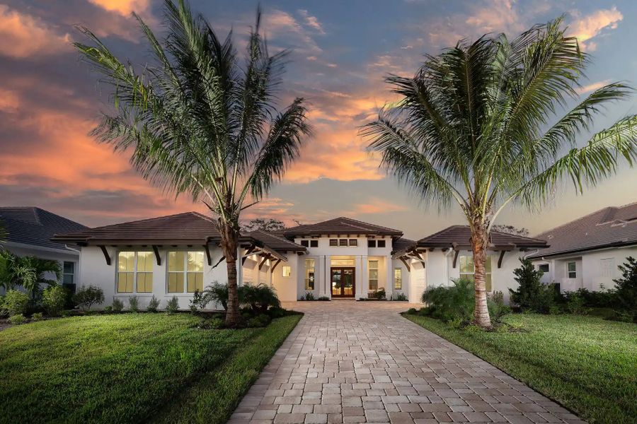 Front exterior of a home in the The River Club at Carlton community, located in Indian River Shores, FL (Image 4). Front exterior of a home in the The River Club at Carlton community, located in Indian River Shores, FL (Image 4).