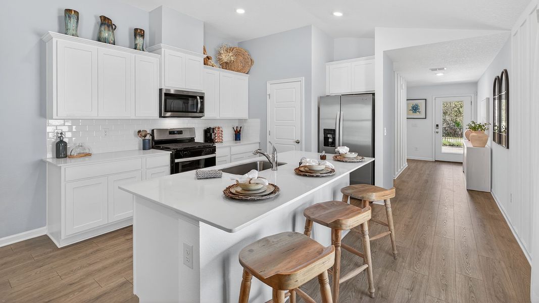 Furnished interior in a model home at Liberty Cove in Yulee (Image 10).