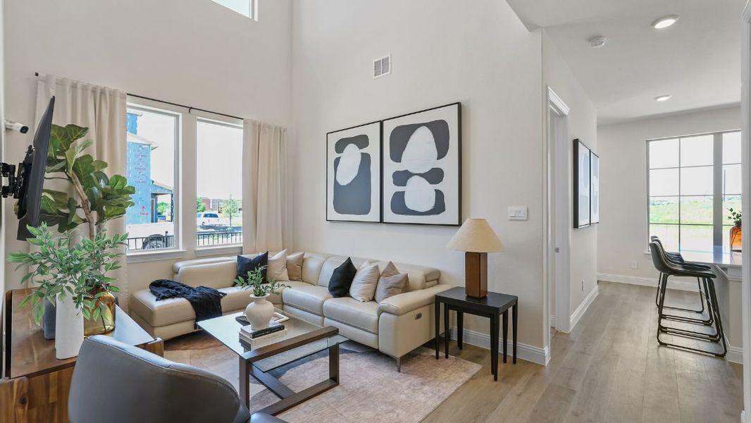 Furnished interior in a model home at Mustang Square in Plano (Image 2).