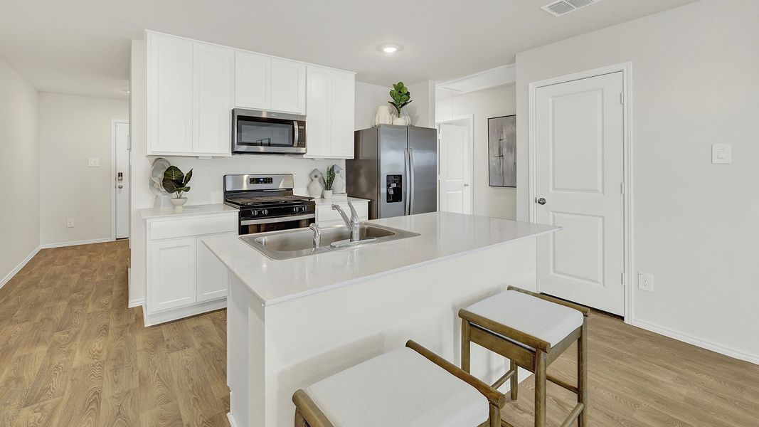 Furnished interior in a model home at Lantana in Lockhart (Image 6).