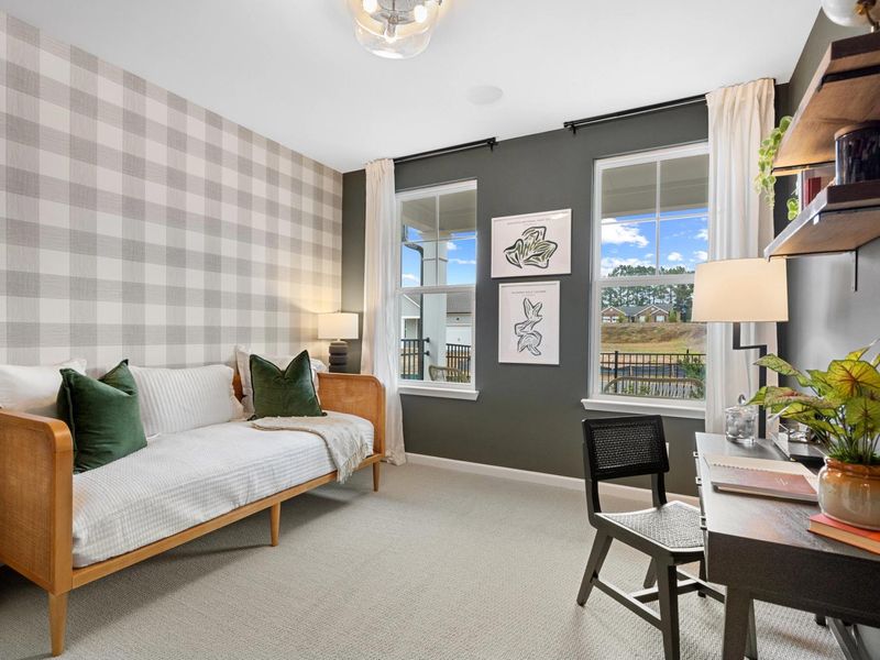 Furnished interior in a model home at Kelly Preserve in Loganville (Image 9).