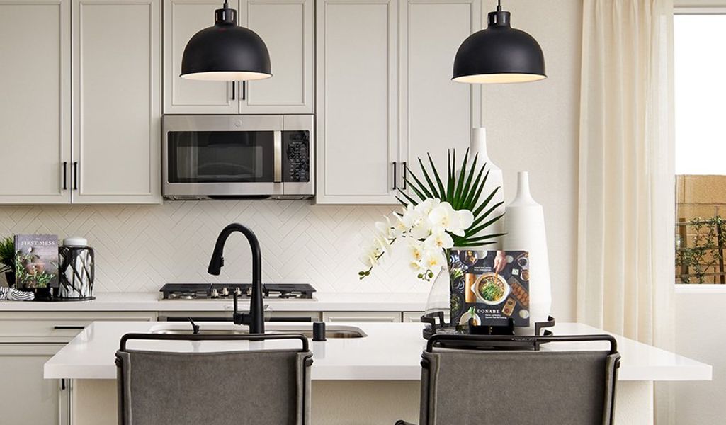 Furnished interior in a model home at Meridian at Star Valley in Tucson (Image 16).