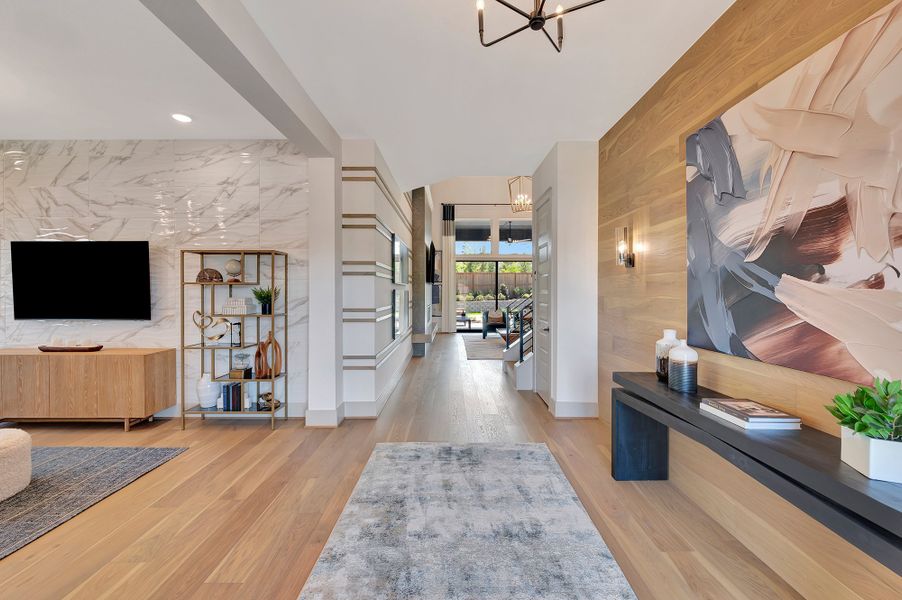 Furnished interior in a model home at The Woodlands Hills - Premier Collection in Willis (Image 5).