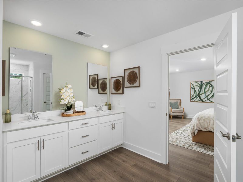Furnished interior in a model home at The Coves at Lakes of Cane Bay in Summerville (Image 32). Furnished interior in a model home at The Coves at Lakes of Cane Bay in Summerville (Image 32).