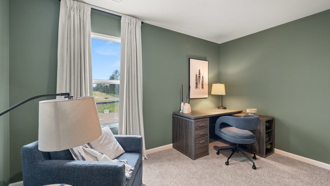 Furnished interior in a model home at Fairway 17 at Mirror Lake in Villa Rica (Image 48).