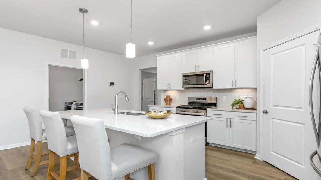 Furnished interior in a model home at Quarry Hills - Freedom in Swepsonville (Image 12).