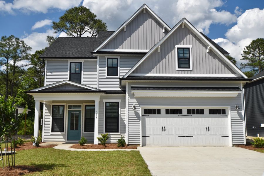 Front exterior of a home in the Murray Woods community, located in Wilmington, NC (Image 1). Front exterior of a home in the Murray Woods community, located in Wilmington, NC (Image 1).
