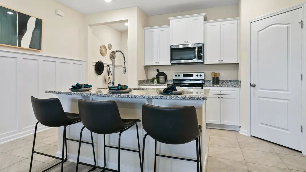 Furnished interior in a model home at Bridgewater in St. Augustine (Image 5).