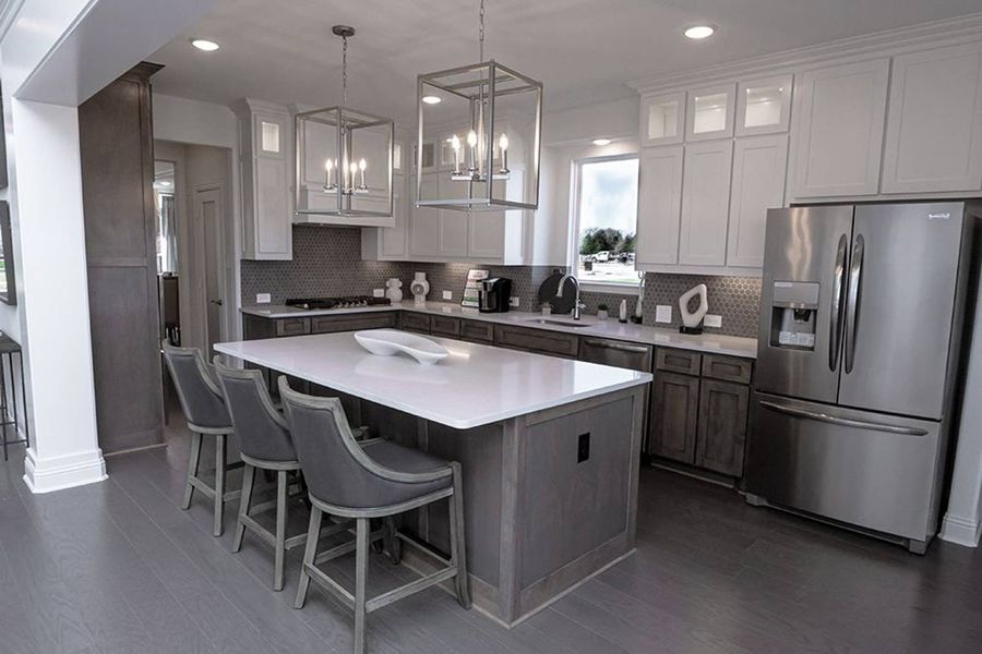Furnished interior in a model home at Oaks of North Grove in Waxahachie (Image 5).