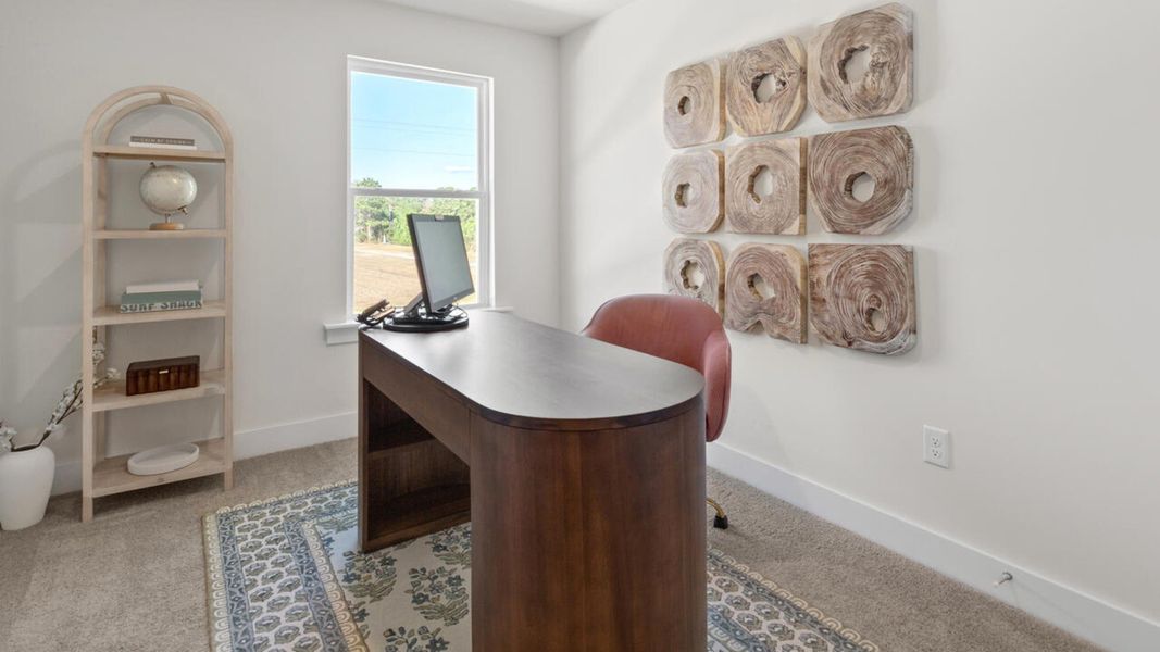 Furnished interior in a model home at Waterside Townhomes in Surf City (Image 24).