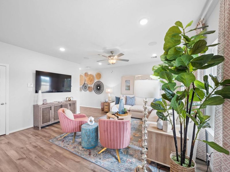 Furnished interior in a model home at Hill & Dale Ranch in Splendora (Image 7).