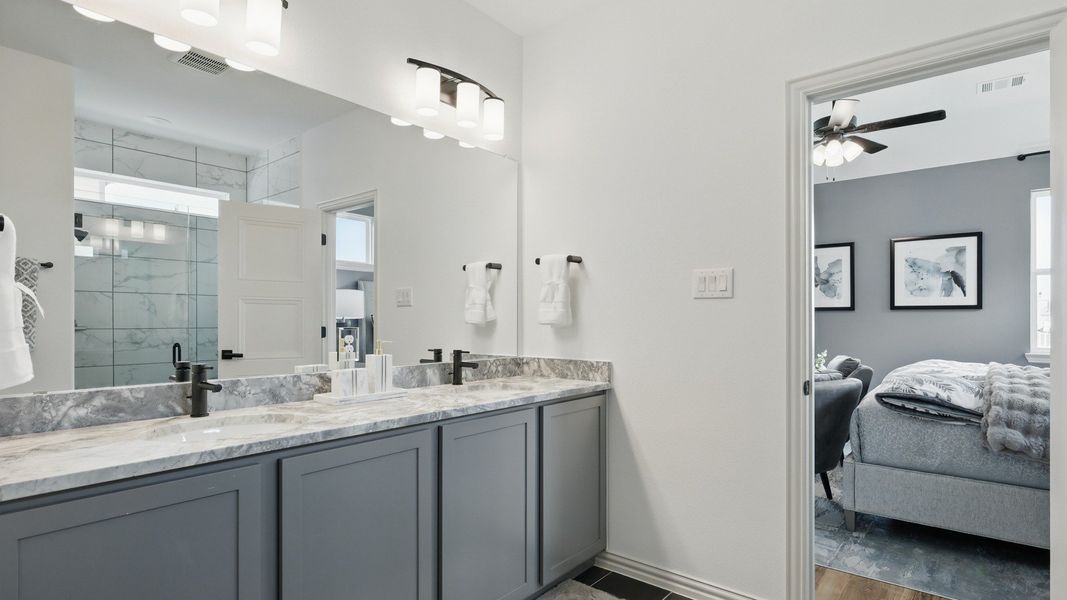 Furnished interior in a model home at Westridge Journey in McKinney (Image 31).