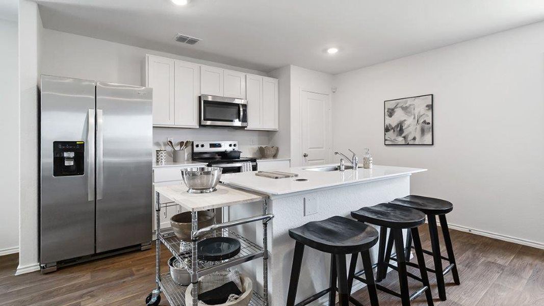 Furnished interior in a model home at Lucero in San Antonio (Image 6).