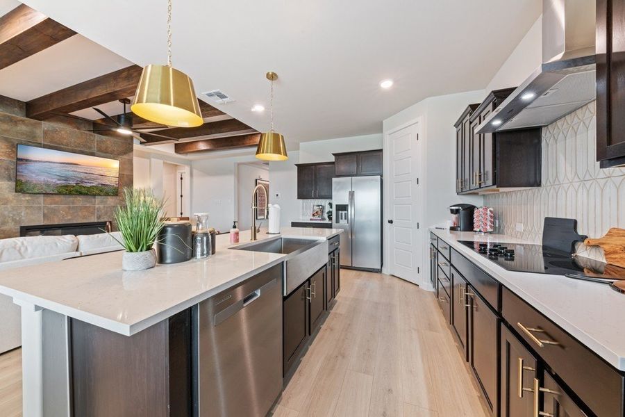 Furnished interior in a model home at The Woodlands in Mico (Image 9).