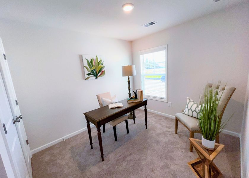 Furnished interior in a model home at Village at Boulware in Lugoff (Image 40).
