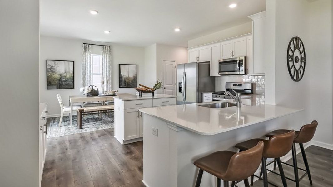 Furnished interior in a model home at The Reserve at Prestleigh in Wake Forest (Image 9).