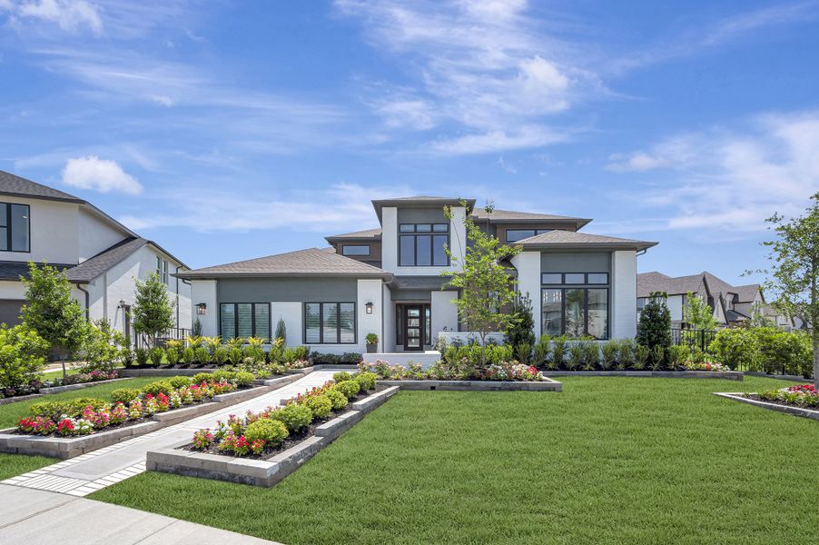 Front exterior of a home in the Prairieland Village - Summit Collection community, located in Cypress, TX (Image 2). Front exterior of a home in the Prairieland Village - Summit Collection community, located in Cypress, TX (Image 2).