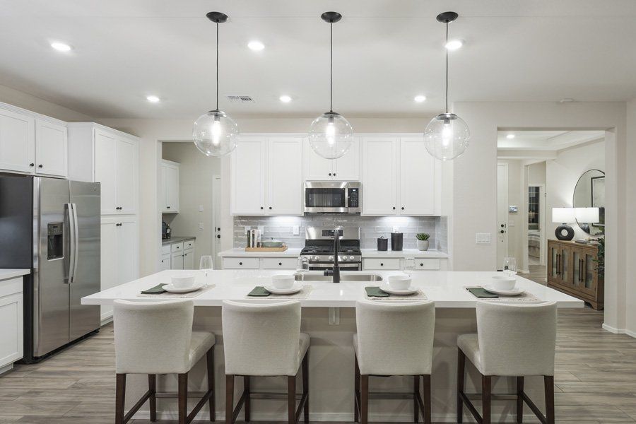 Furnished interior in a model home at Windrose V in Waddell (Image 39).