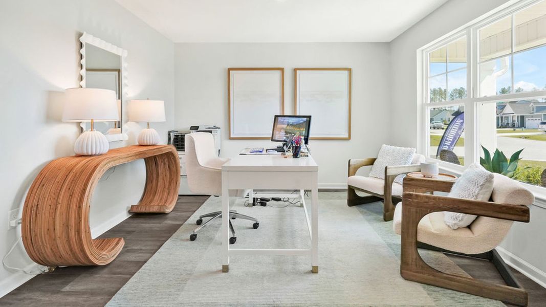Furnished interior in a model home at Bella Point in Bolivia (Image 20).