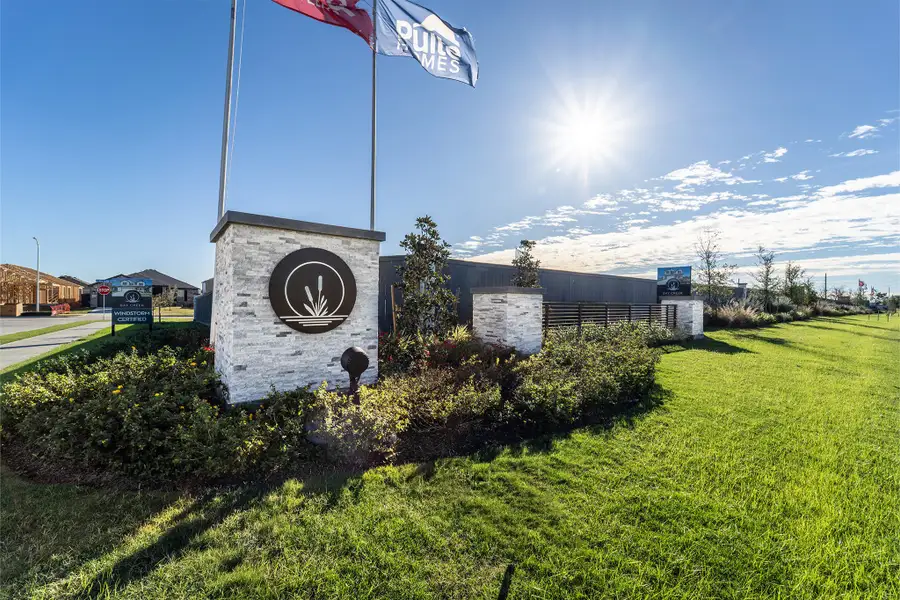 Entrance to the Bay Creek community in Baytown, TX, featuring signage and landscaping (Image 14).