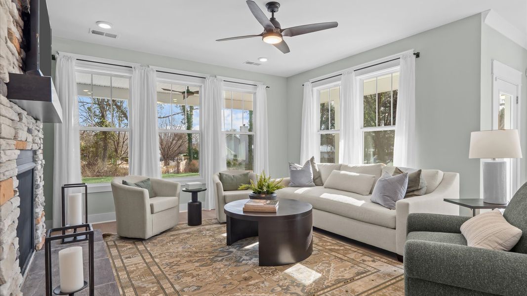 Notable family room designed with high standards—perfect for both everyday living and entertaining by DRB Homes Notable family room designed with high standards—perfect for both everyday living and entertaining by DRB Homes