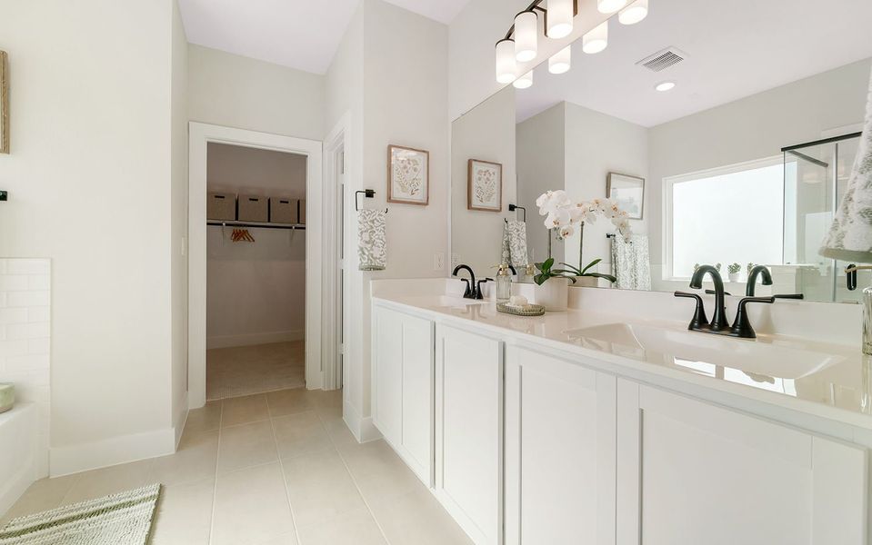 Furnished interior in a model home at Grande Estates in Bertram (Image 29).