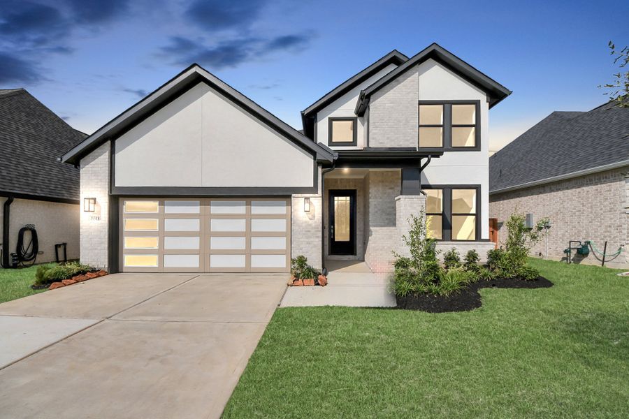 Front exterior of a home in the Pinevale community, located in Tomball, TX (Image 2).
