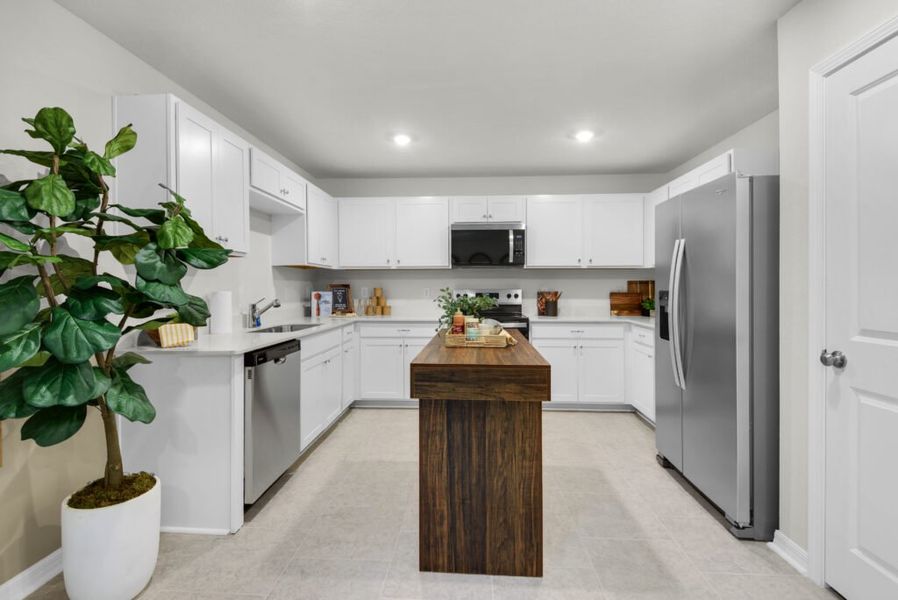 Furnished interior in a model home at Cochran Commons in Milton (Image 4).