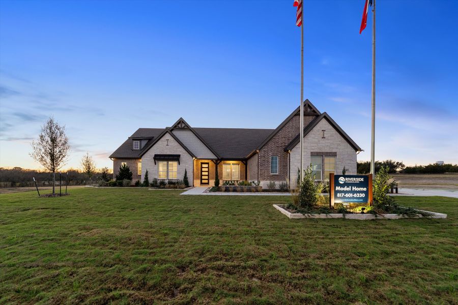 Front exterior of a home in the Grayson Ridge community, located in Van Alstyne, TX (Image 20).