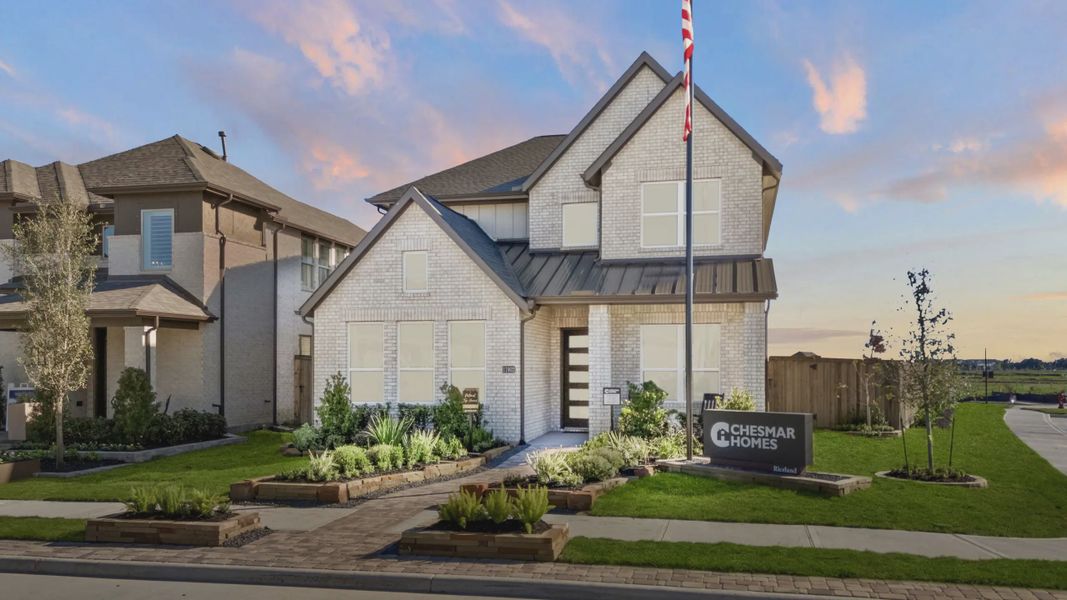 Front exterior of a home in the Riceland 42' Alley Loaded community, located in Mont Belvieu, TX (Image 1). Front exterior of a home in the Riceland 42' Alley Loaded community, located in Mont Belvieu, TX (Image 1).