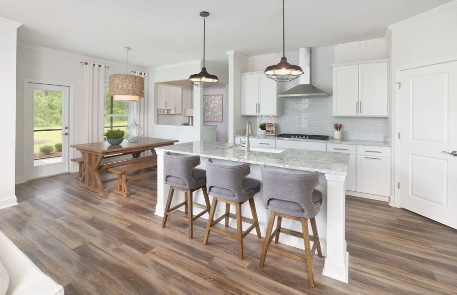 Carriage Estates kitchen with large island links to cafe in new construction homes in Lexington, SC Carriage Estates kitchen with large island links to cafe in new construction homes in Lexington, SC