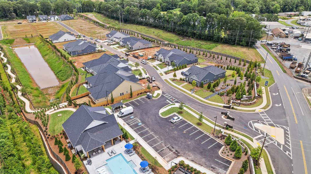 Aerial view of the Maple Grove at Towne Lake community in Woodstock, GA, showing layout and nearby surroundings (Image 1). Aerial view of the Maple Grove at Towne Lake community in Woodstock, GA, showing layout and nearby surroundings (Image 1).