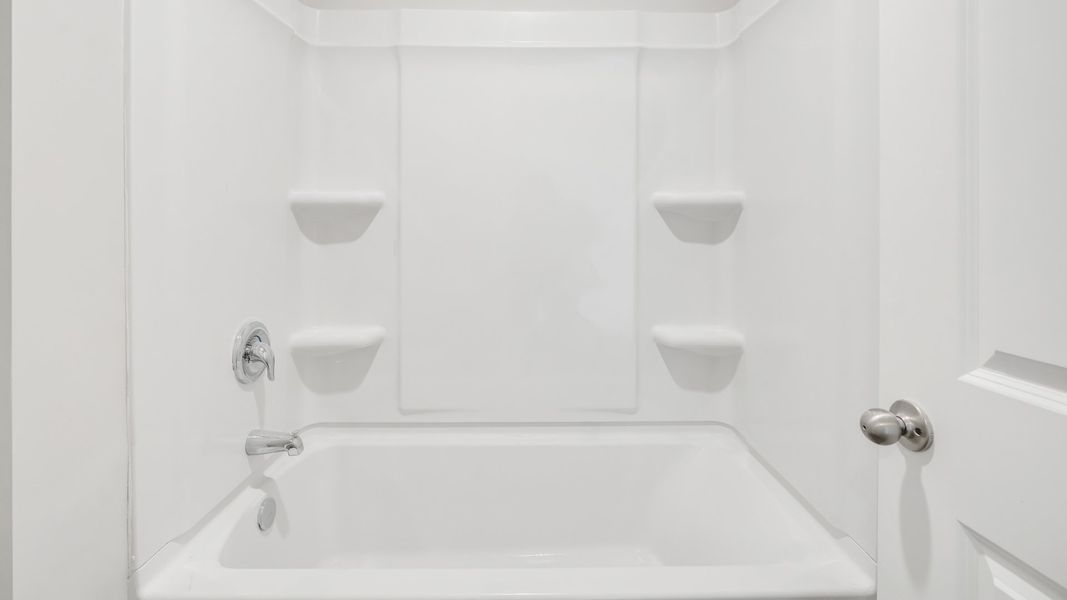 Furnished interior in a model home at The Pines at Blake Farm in Wilmington (Image 18). Furnished interior in a model home at The Pines at Blake Farm in Wilmington (Image 18).