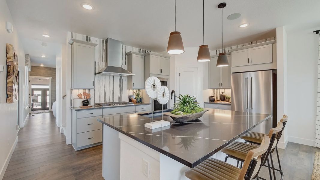 Furnished interior in a model home at Westerly in Erie (Image 8).