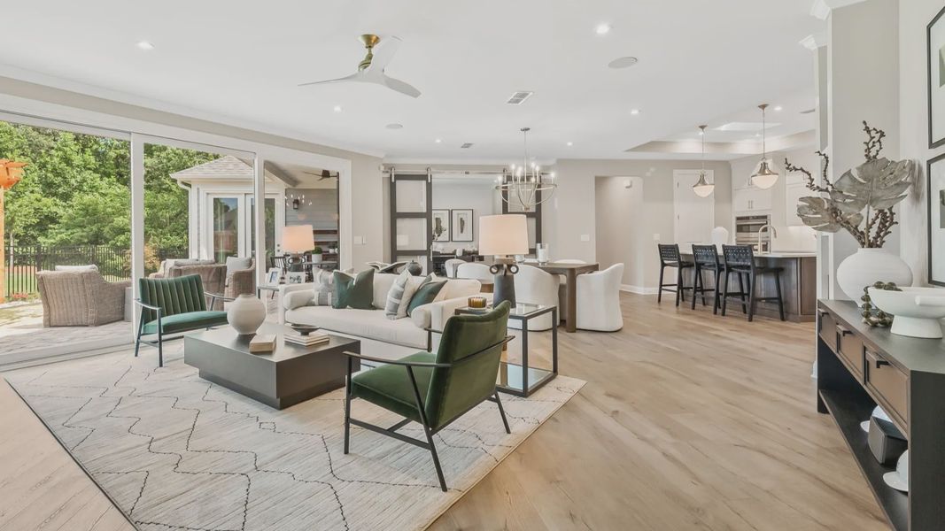 Furnished interior in a model home at The Courtyards at Post Road in Cumming (Image 14).