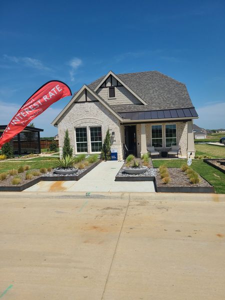 Charming home with elegant landscaping in Pinnacle at Legacy Hills by Pulte Homes, Celina, TX.