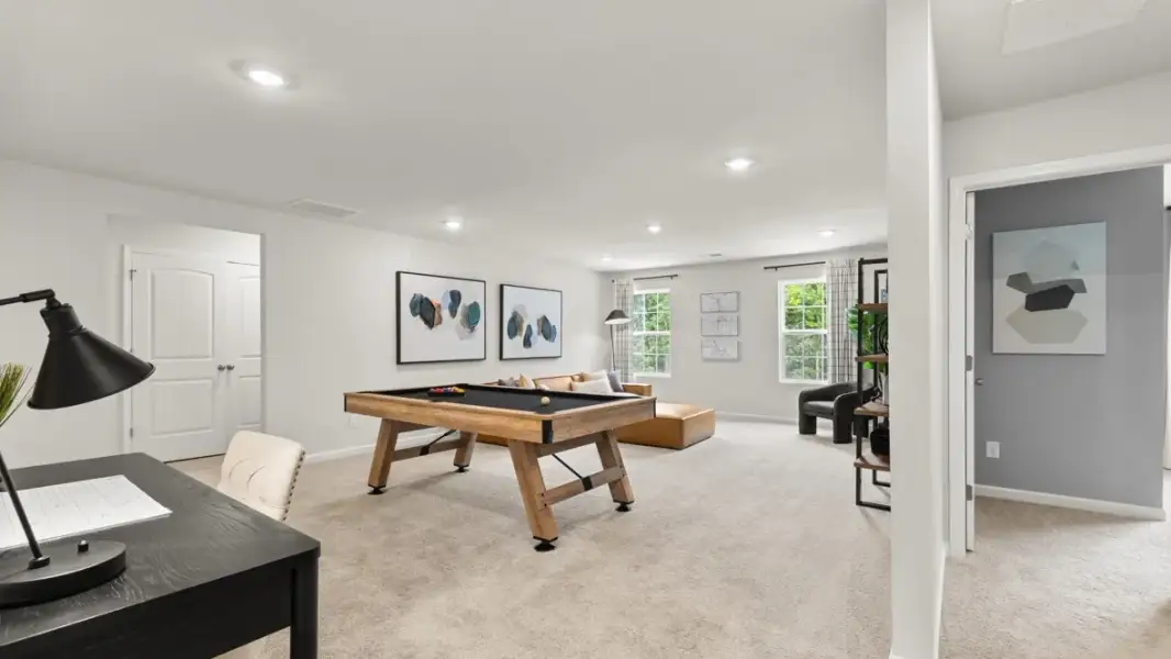 Furnished interior in a model home at Enclave at Stonewall Tell in South Fulton (Image 13).