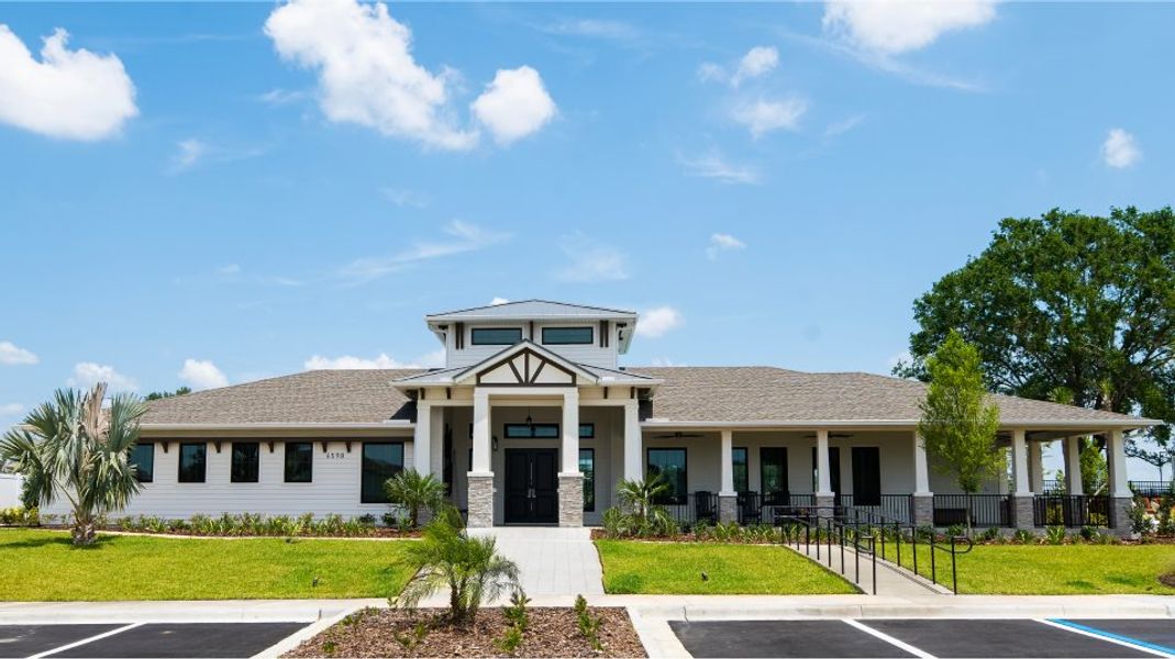 Front exterior of a home in the Abbott Square: The Townhomes community, located in Zephyrhills, FL (Image 10).