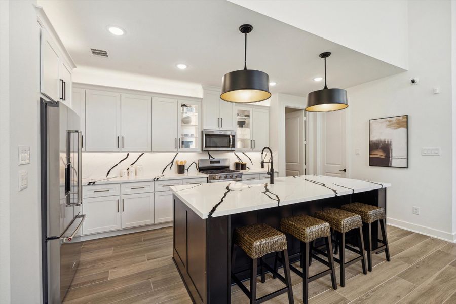 Furnished interior in a model home at ARTAVIA® - 40' in Conroe (Image 28).