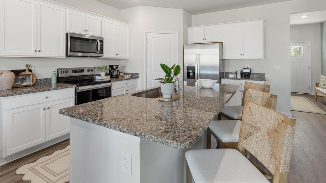 Furnished interior in a model home at Bella Point in Bolivia (Image 6). Furnished interior in a model home at Bella Point in Bolivia (Image 6).