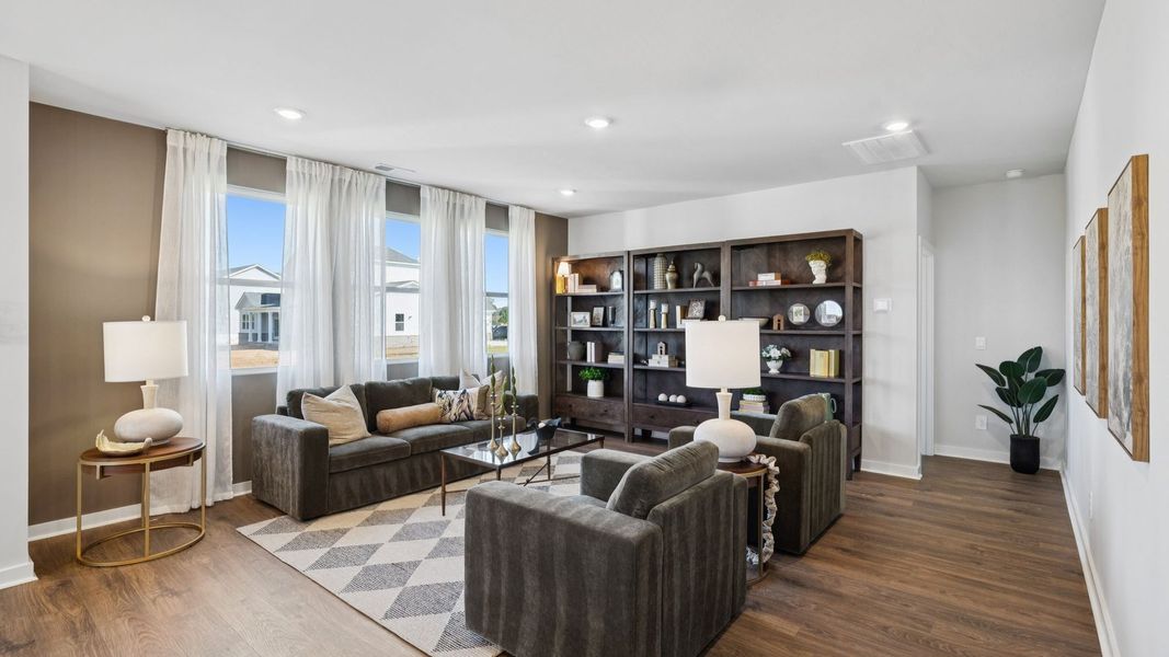 Furnished interior in a model home at Harvest Point in Spring Hill (Image 39).