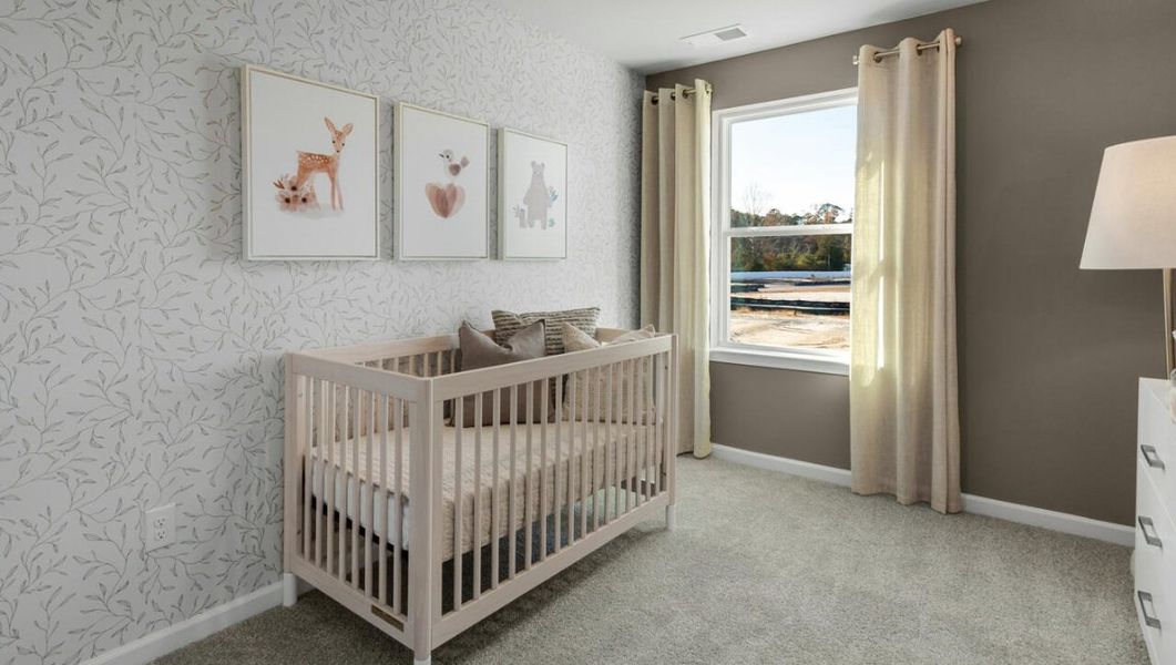 Furnished interior in a model home at Waterside Townhomes in Surf City (Image 20).