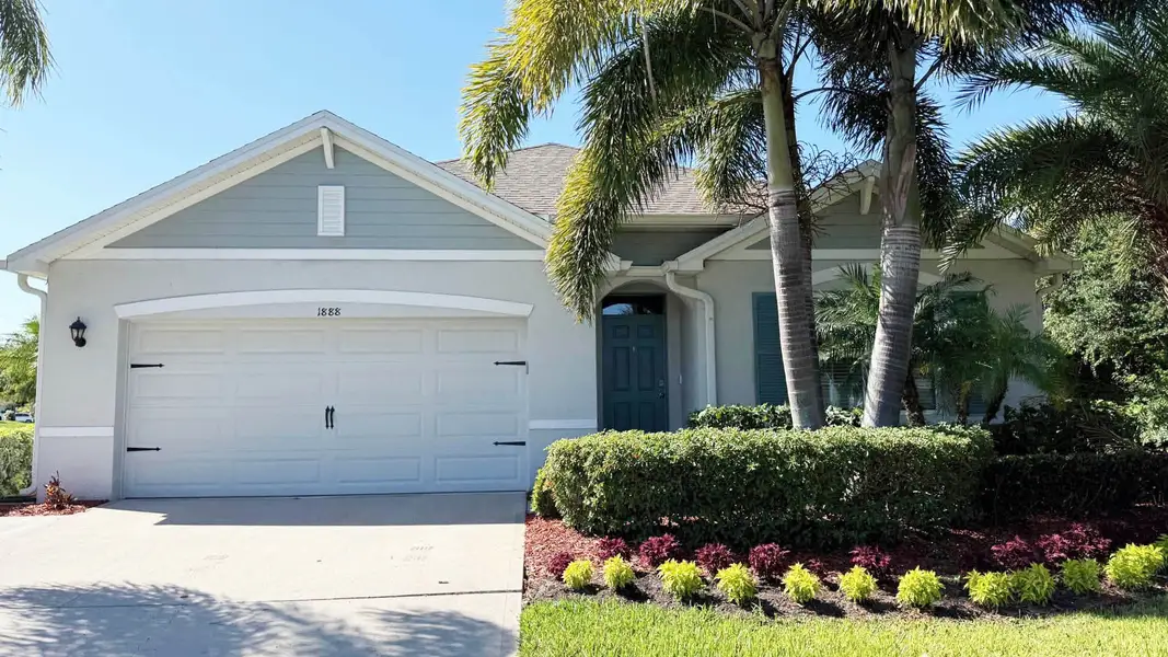 Front exterior of a home in the Sebastian Highlands community, located in Sebastian, FL (Image 1).