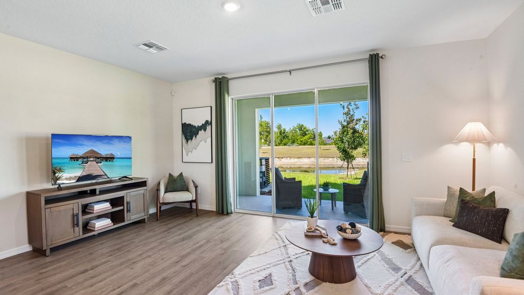 Furnished interior in a model home at Sanctuary at Citrus Park Townhomes in Tampa (Image 14).