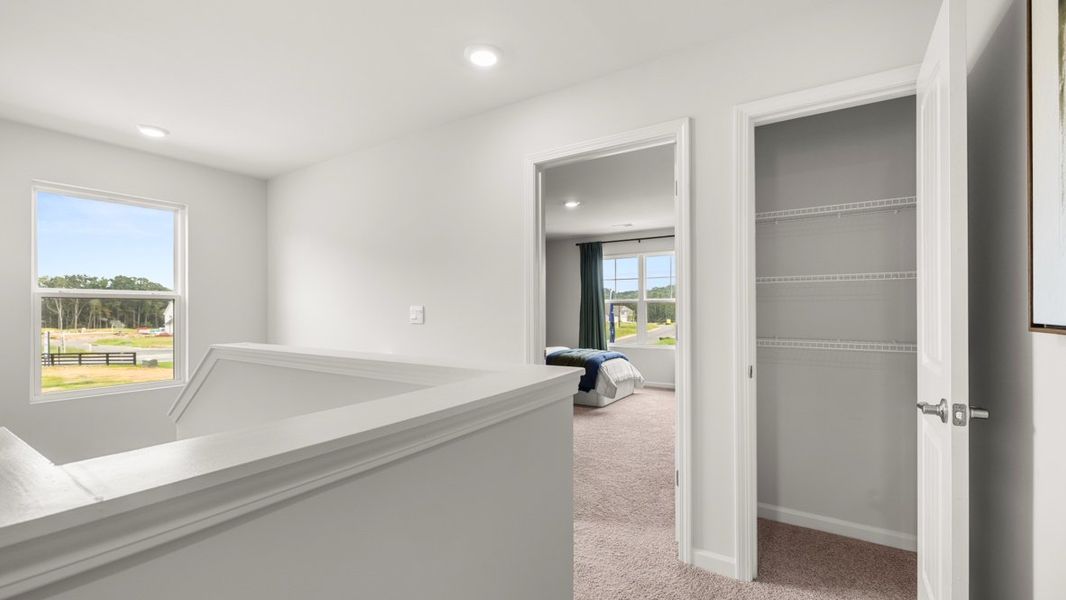 Furnished interior in a model home at Fairway 17 at Mirror Lake in Villa Rica (Image 37).