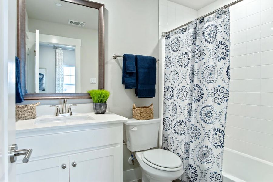 Furnished interior in a model home at Woodbridge Townhomes in Wylie (Image 31).