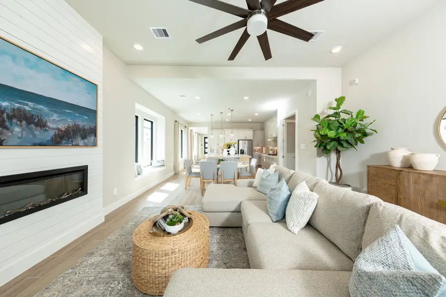 Furnished interior in a model home at The Highlands in Porter (Image 4).